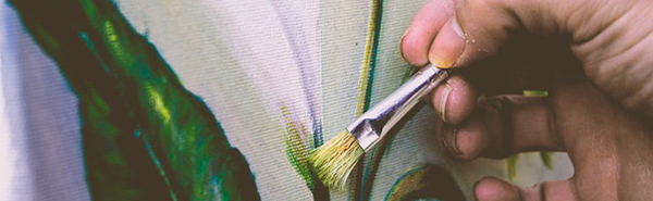 Painter using a brush